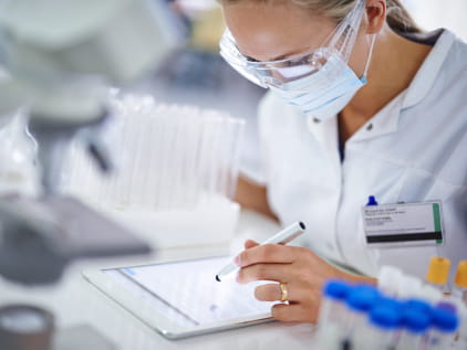 Female lab tech with tablet