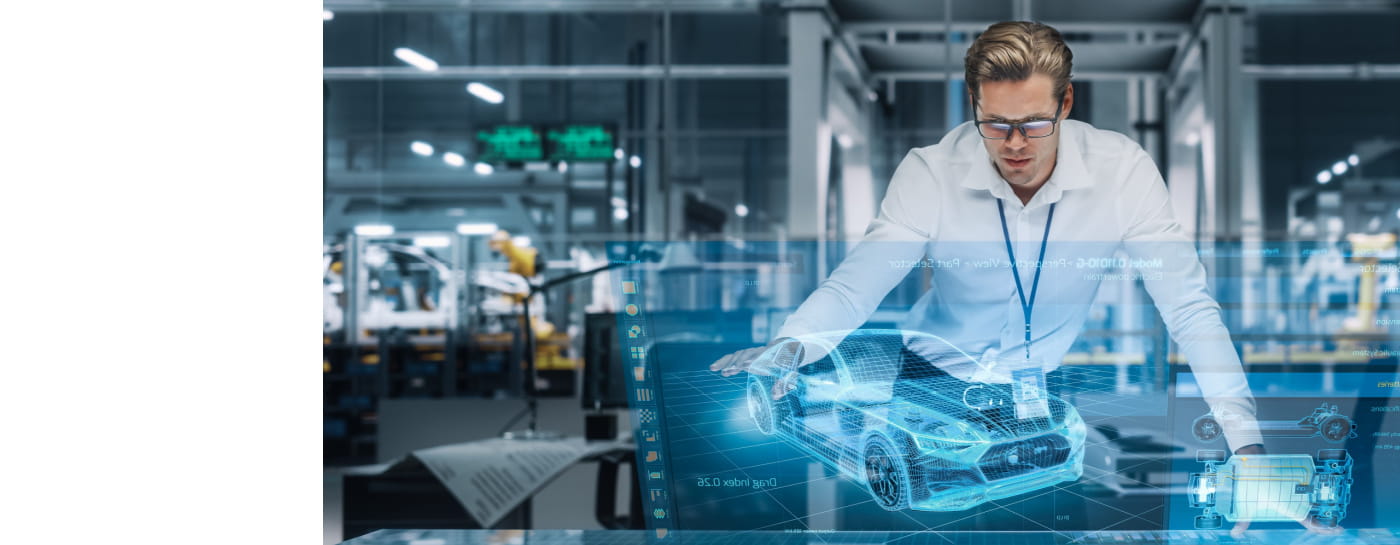 A worker interacts with a holographic image of a car