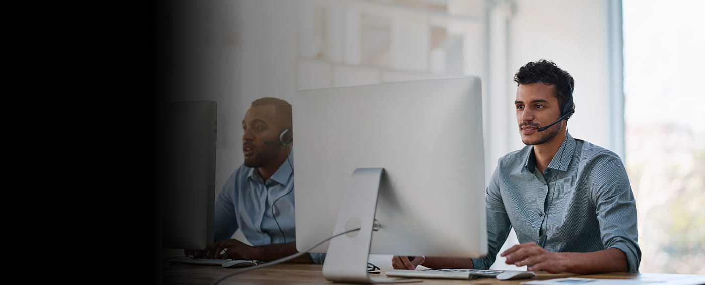 2 IT techs with headsets- leftside dark fade