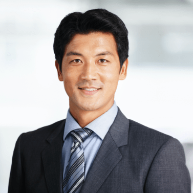 Head shot of man in suit and tie