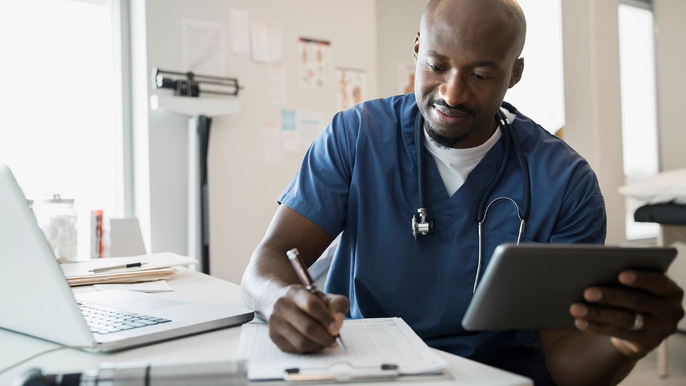 healthcare worker completing medical documentation