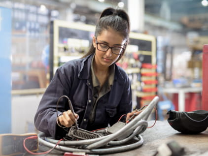 Female electrician on the job