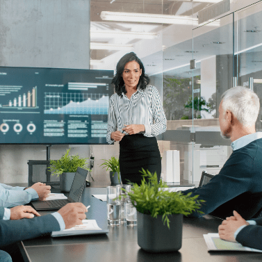 Woman giving presentation in conference room